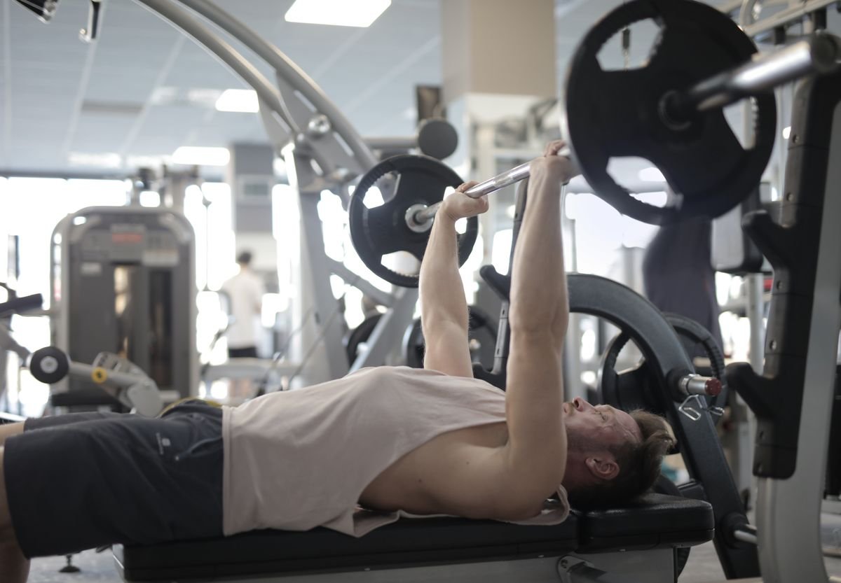Athlete training with a barbell in the gym